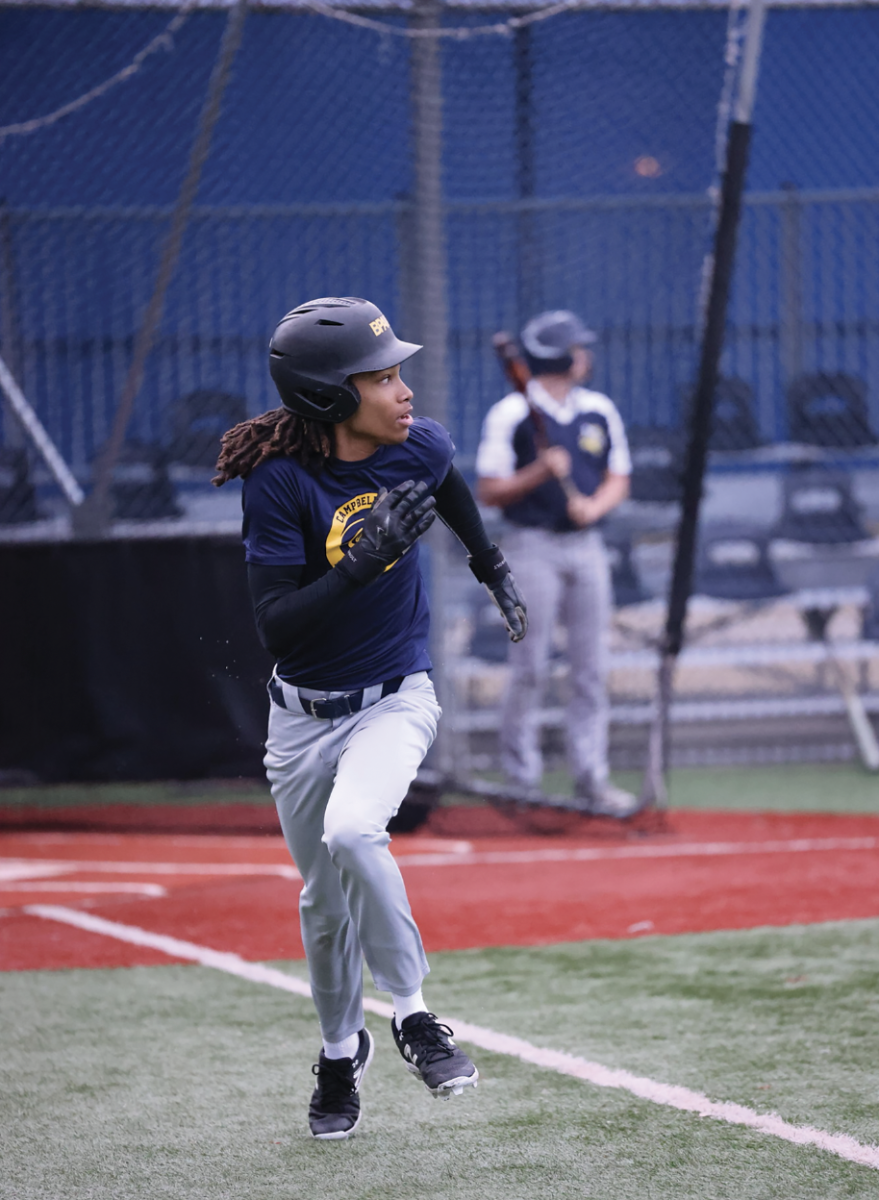 Nasir A. '27 runs to first base as they practice for an important upcoming game against their rival, Brentwood, on May 6